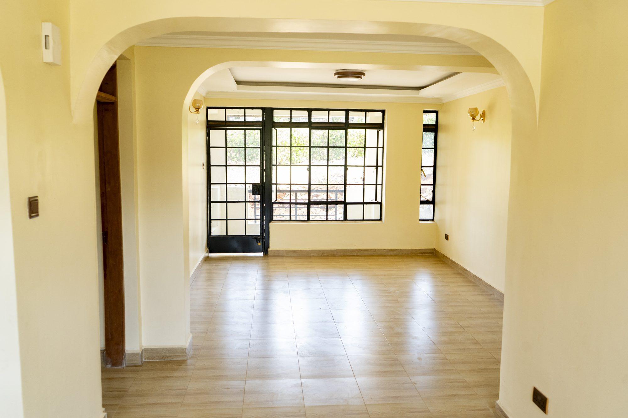 Living area with archway, Block One